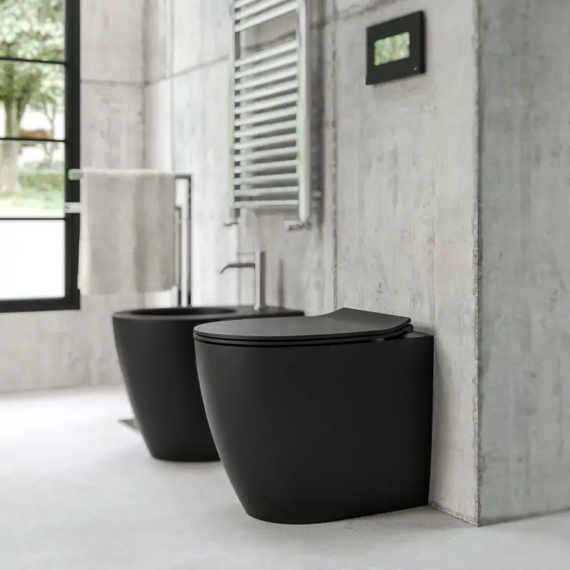 Compact standing toilet for small spaces