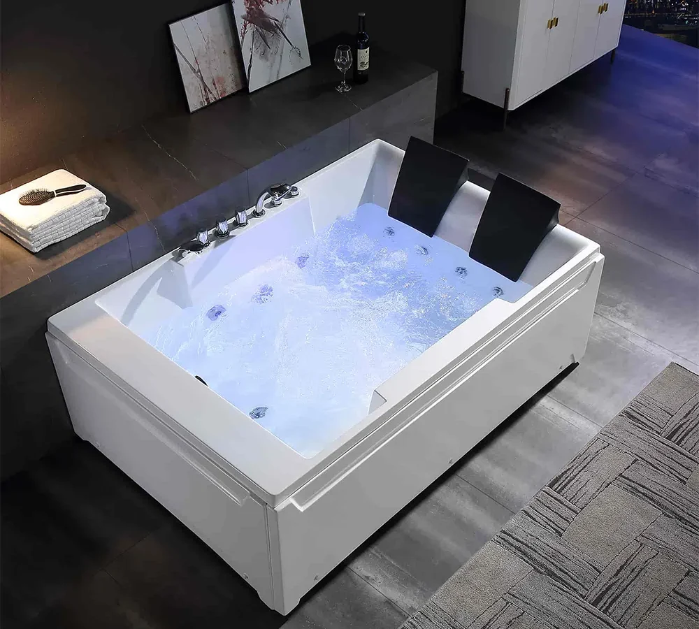 Luxury whirlpool bathtub with headrests and water jets exported by QuickExim.